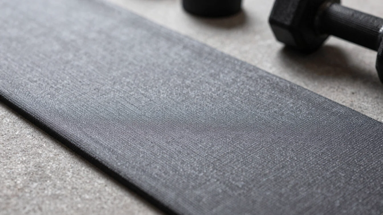 Macro shot of gym gear fabric and weight training accessory textures